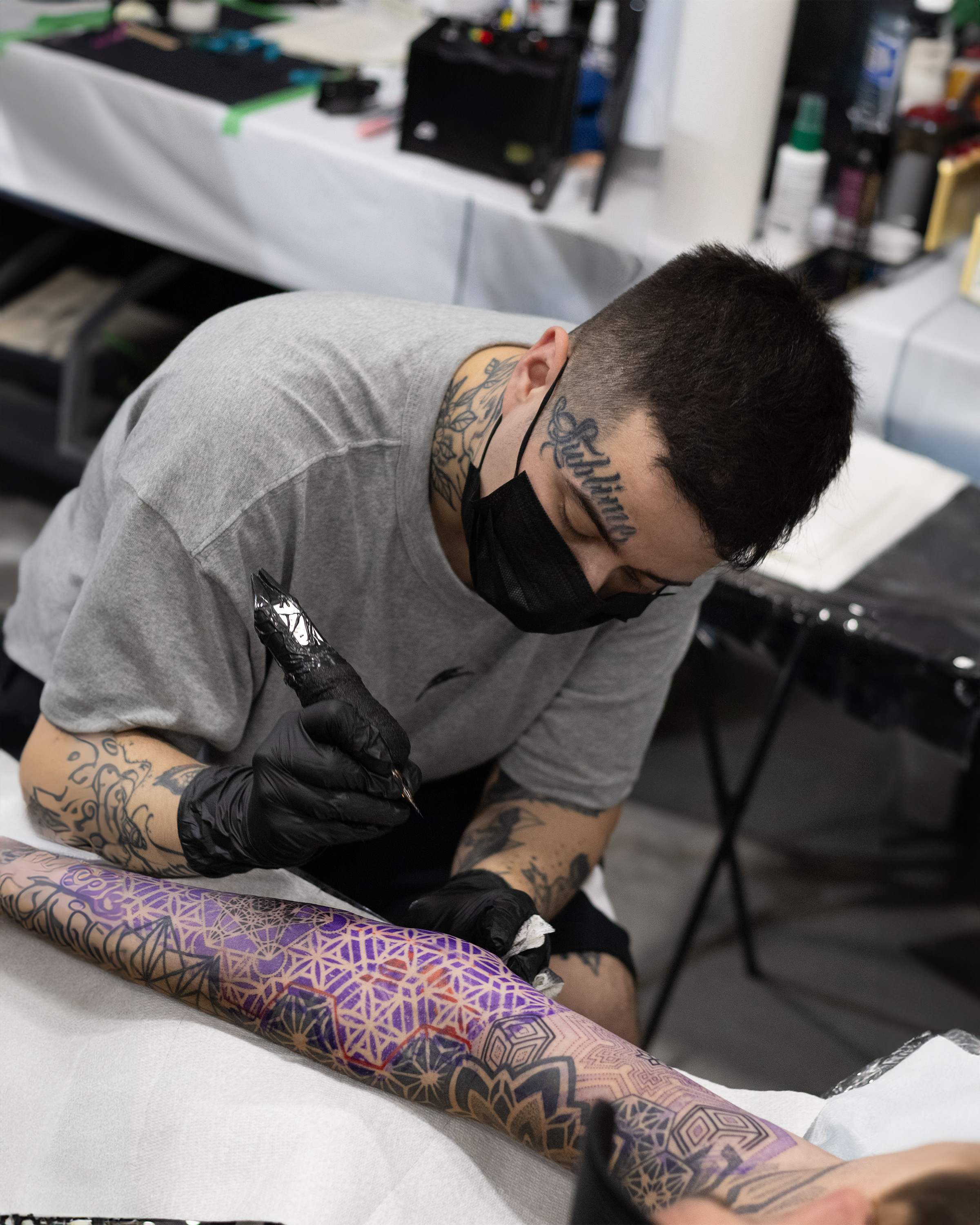 Juan Pablo Jblessink tattooing a large-scale geometric project in Toronto